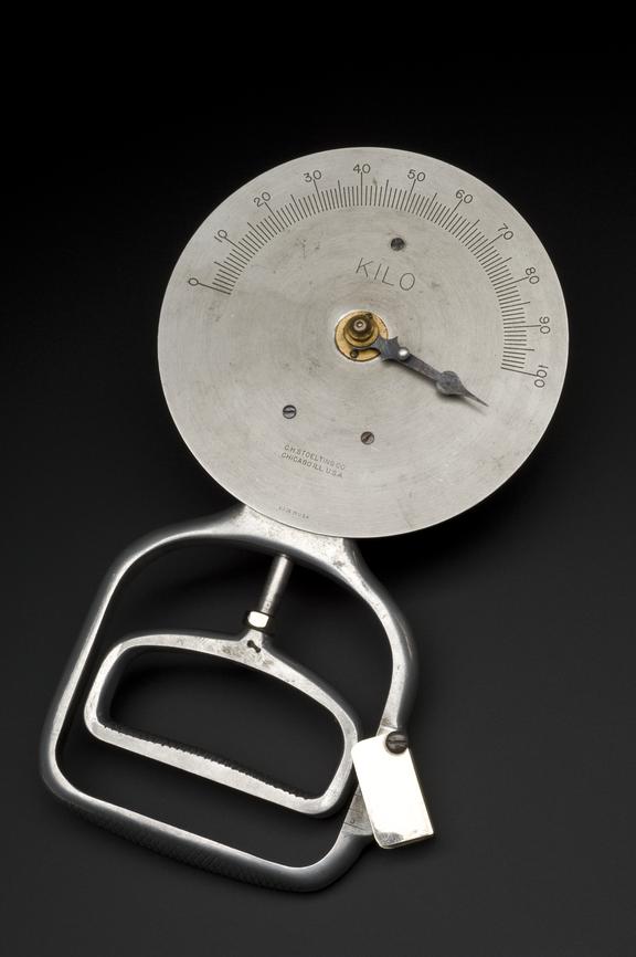 Dynamometer; for measuring strength of grip; used on the