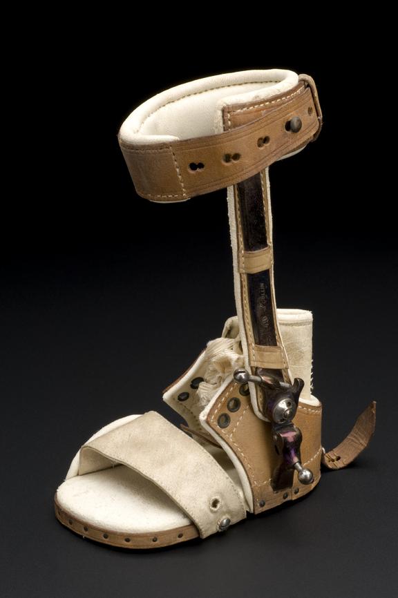 Child's foot support for treatment of club-foot, wood