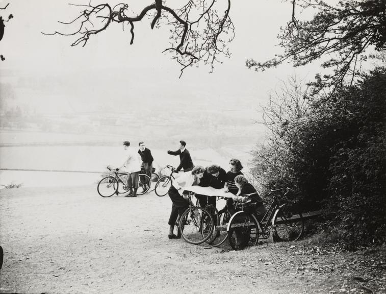 Cyclists Studying Maps