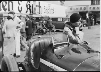 Frau Steinweg beside a car