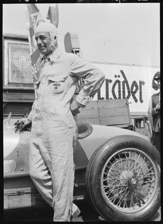 Francis Curzon, 5th Earl Howe, with his racing car