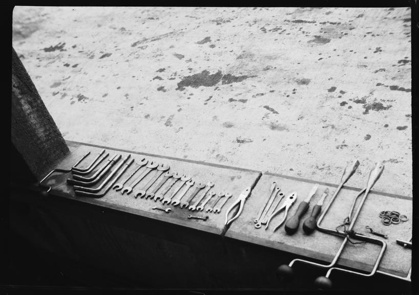 Mechanic's tools laid out on pit counter, AVUS race track