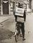 Special Constable carrying a 'Raiders Passed' sign