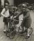Children playing on bicycles
