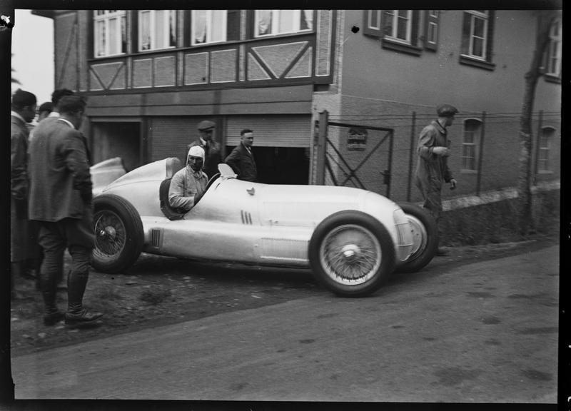 Hanns Geier at wheel of Mercedes-Benz W25 GP racing car