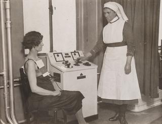 A nurse gives electrical treatment