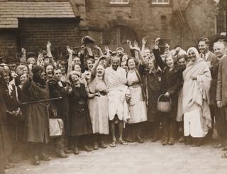Gandhi with a crowd of supporters