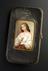 Leather cigar case bearing porcelain plaque of lady, with cigar