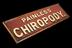 Sign, mirrored glass, "Painless Chiropody"
    Full view