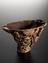 Rhinoceros horn cup, carved in high relief on outside, Chinese