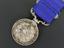 Silver medal, blue silk ribbon