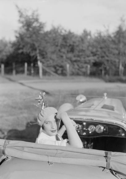 Woman in the driving seat of a car