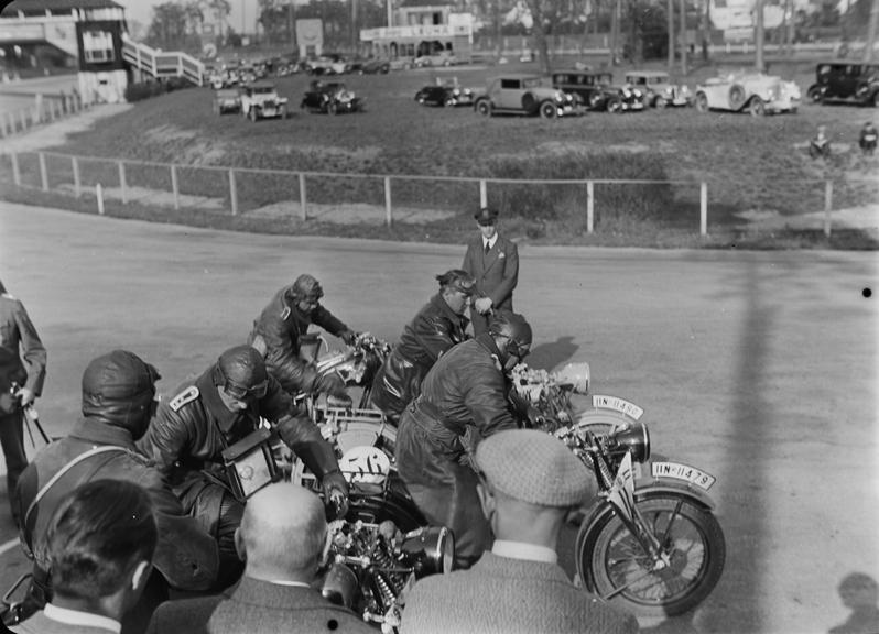 Motorcyclists prepare for a race