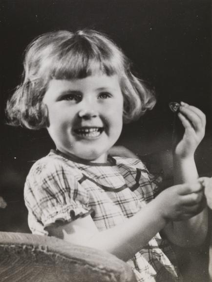 Child holding a chocolate