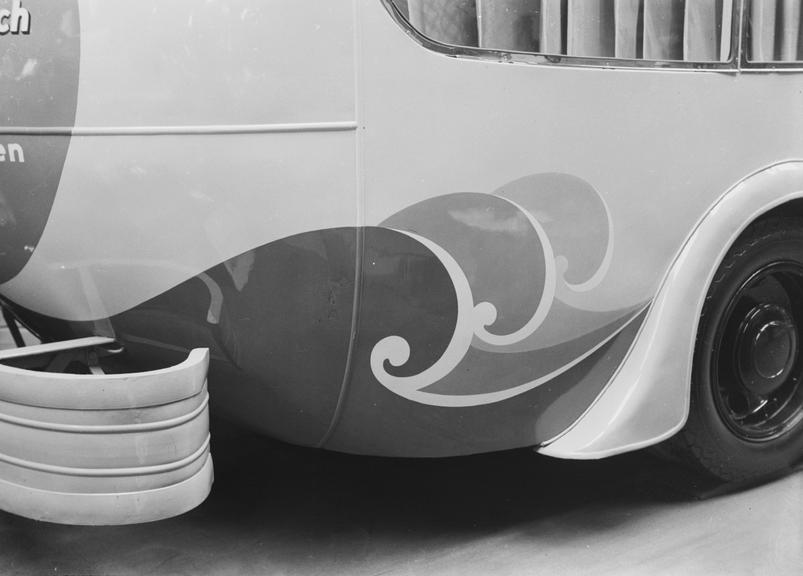 View of the rear of a vehicle, decorated with waves