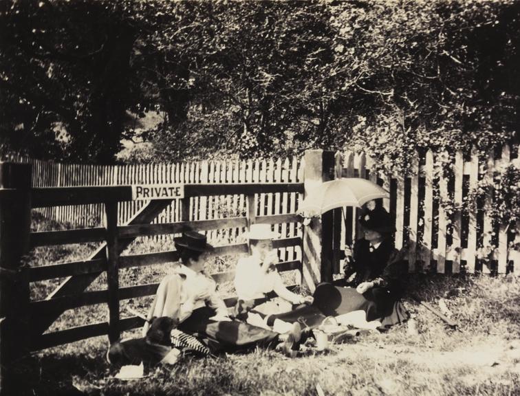 Picnic next to a gate