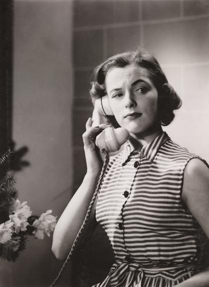 Woman using a telephone