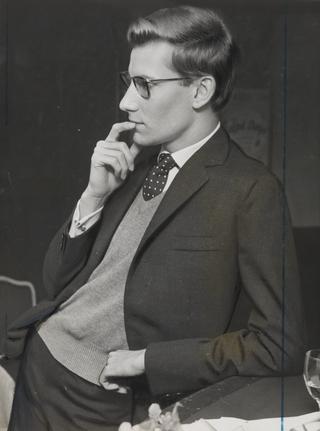 Portrait of Yves Saint Laurent looking thoughtful