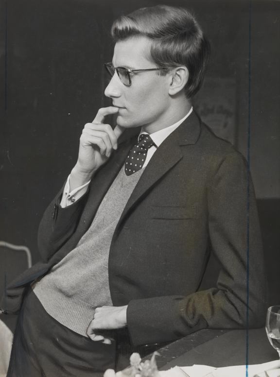 Portrait of Yves Saint Laurent looking thoughtful
    A photograph