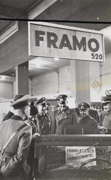 Nazi officers surround a Framo 'Piccolo' car