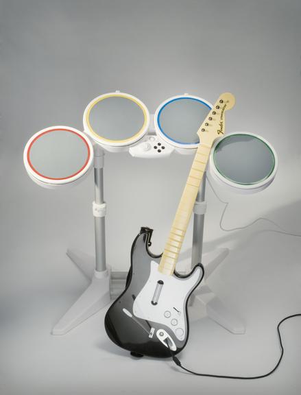 Harmonix Rock Band prototype material
    A guitar and drumset