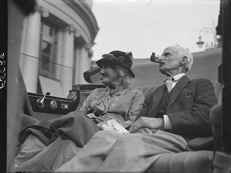 'Elderly country couple sit in car during London trip'
    A