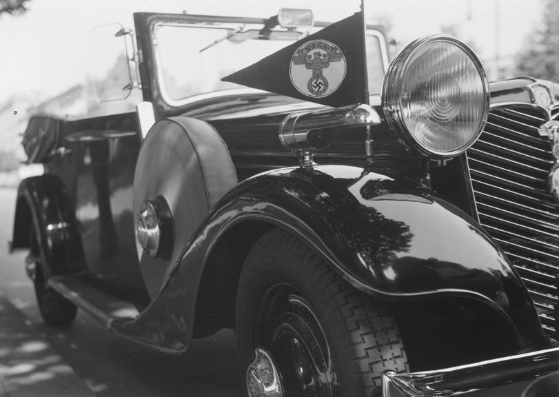 Stoewer car with N.S.K.K. flag