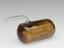 A sealed cylindrical vial of whale oil from the exhibit on the