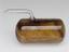 A sealed cylindrical vial of whale oil from the exhibit on the