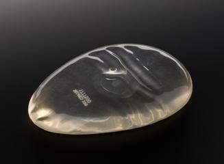 Gluteal implant for plastic surgery