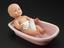 Infant doll with feeding bottle and baby bath used in