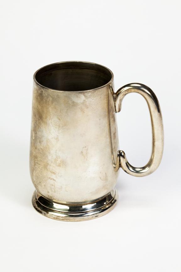 Silver tankard cycling trophy won by Wilf Higgins.