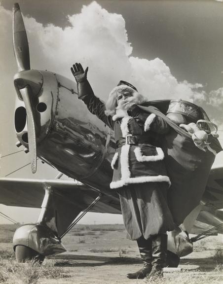 Father Christmas arrives the modern way