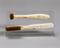 Two horsehair toothbrushes with ivoride handles produced by