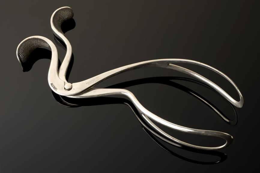Obstetrical forceps, steel, nickel-plated and ebony