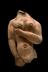 Votive pregnant female figure, torso only, terracotta