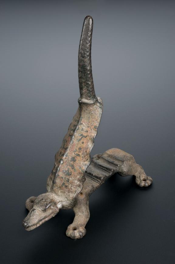 Iron cork presser shaped like a stylised crocodile, Portugese