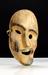 Carved wooden 'Spirit mask'. Front three quarter view