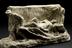 Plaster plaque of stretcher bearers carrying wounded soldier