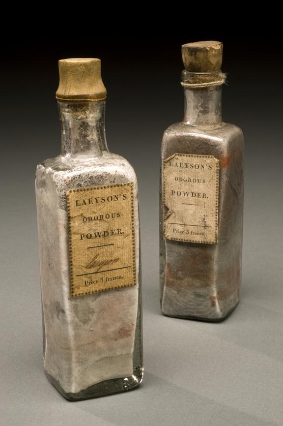 Two bottles of "Lacyson's Odorous Powder" Graduated grey