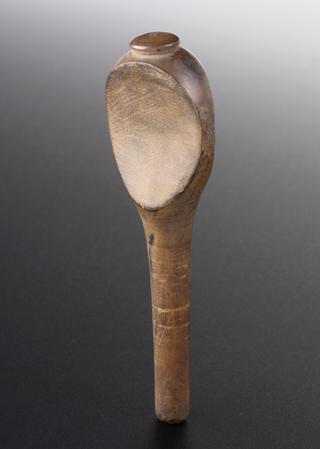 Wooden tuning key for a stringed instrument