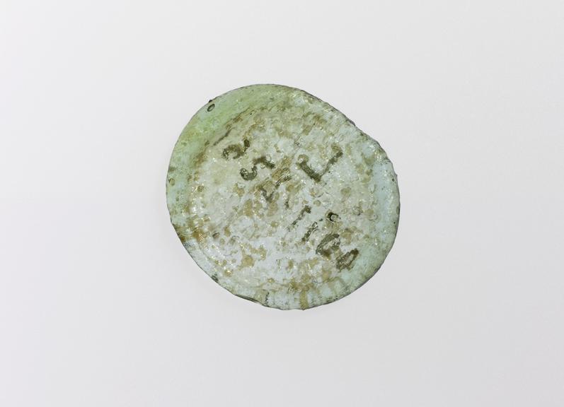 Arabic glass standard weight  for a silver Half-Dirhem (1.45g) (coin weight; standard weight; glass weight)