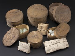 Box, containing brown lumps and powder