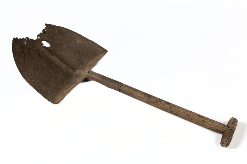 Long handled shovel..Photographed on a white background.