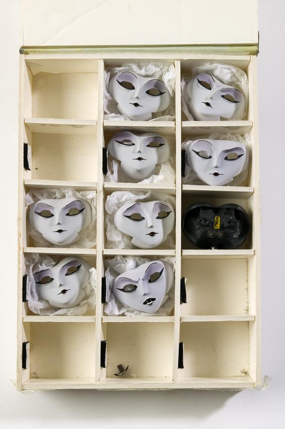 Tray of puppet faces for the Spider character from the 1996