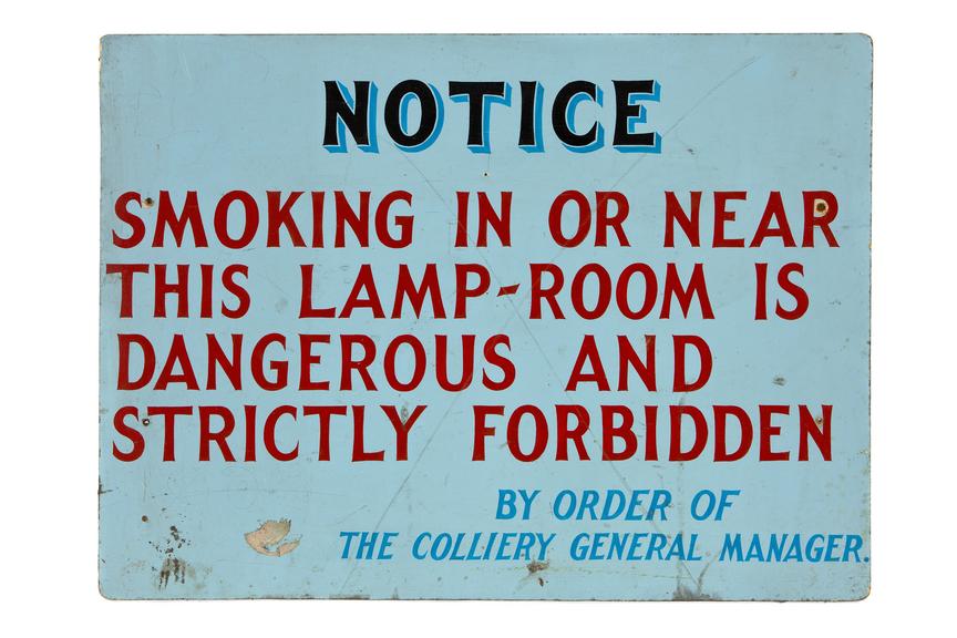 Blue sign: 'Notice smoking in or near the lamp room is