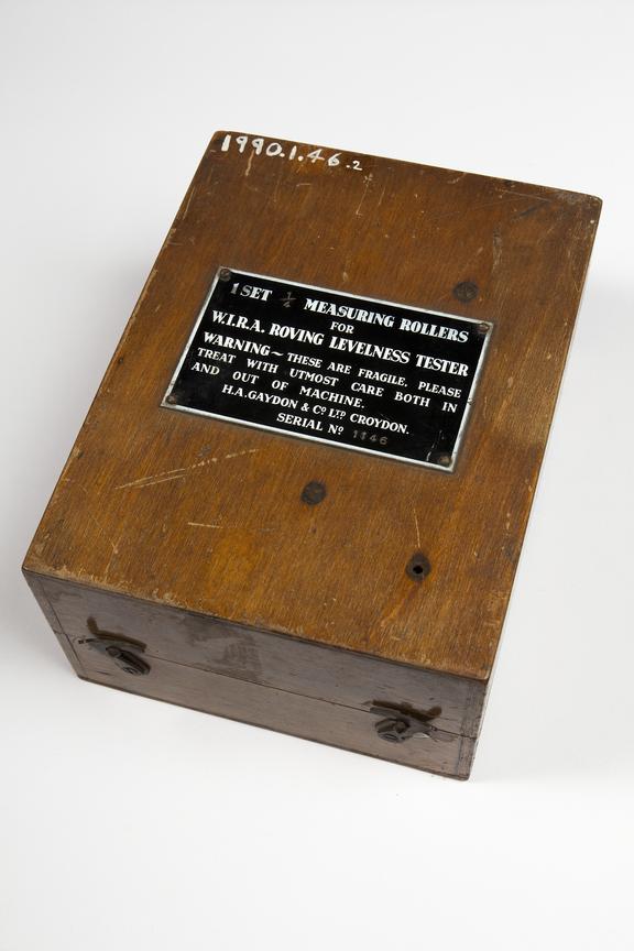 Spinning machinery measuring rollers in a wooden case