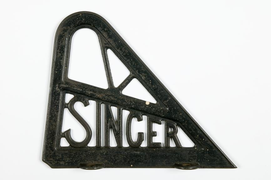 Nameplate for Singer from framework casting of a sewing machine