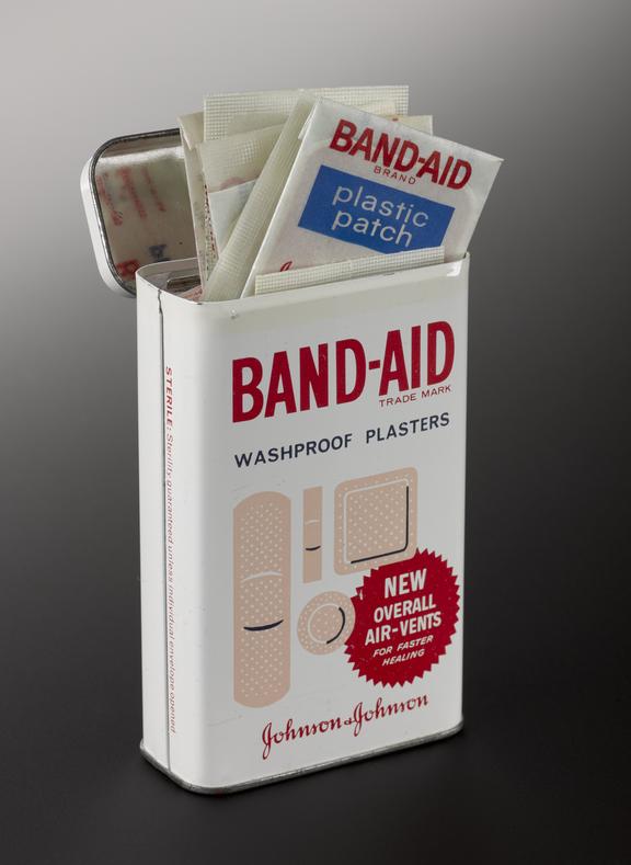 Tin of 'Band-Aid' waterproof plasters made by Johnson & Johnson
