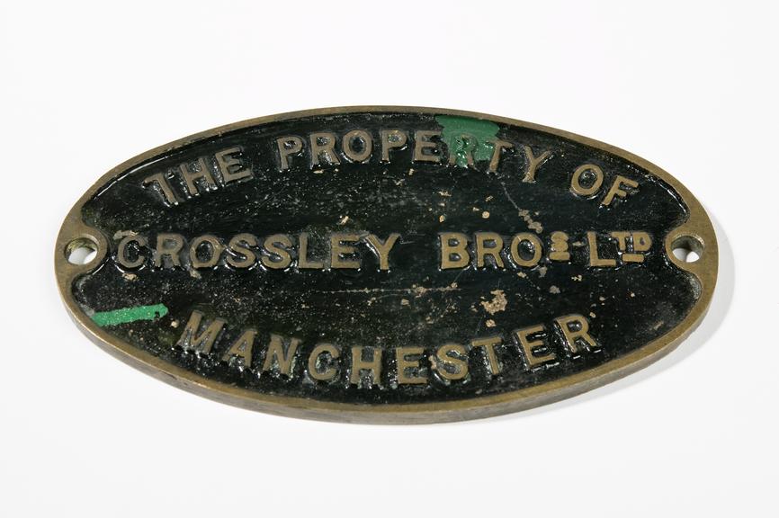 Crossley brothers namplate; has been painted black and speckled